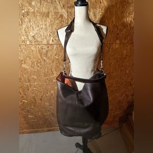 Brown leather convertible bag.